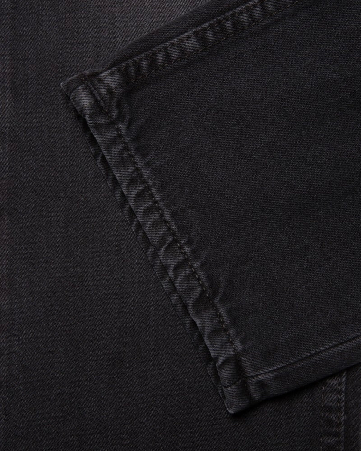Nudie Jeans Steady Eddie II Black Change — Slim fit, 100% biologisch katoen Jeans | Stuen Store Tilburg